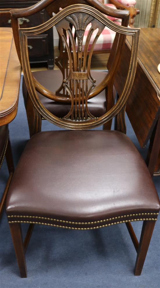 A set of six Hepplewhite style mahogany dining chairs